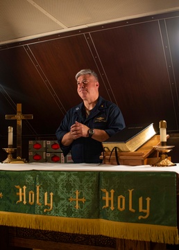 Lt. Ferguson prays in GHWB chapel