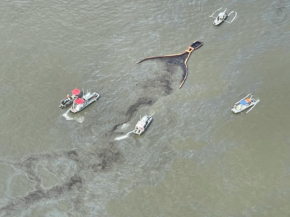 Response vessels recover an oil discharge