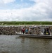 A wildlife and shoreline assessment team surveys for wildlife impacts