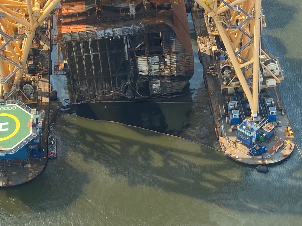 Lifting operations paused due to a discharge of oil