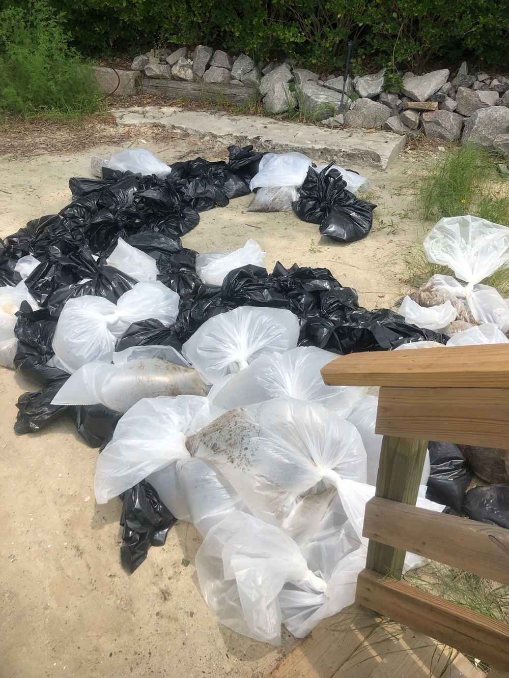 Clean-up teams filled several bags of oiled sand