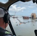 An aerial observer surveys the Golden Ray wreck site