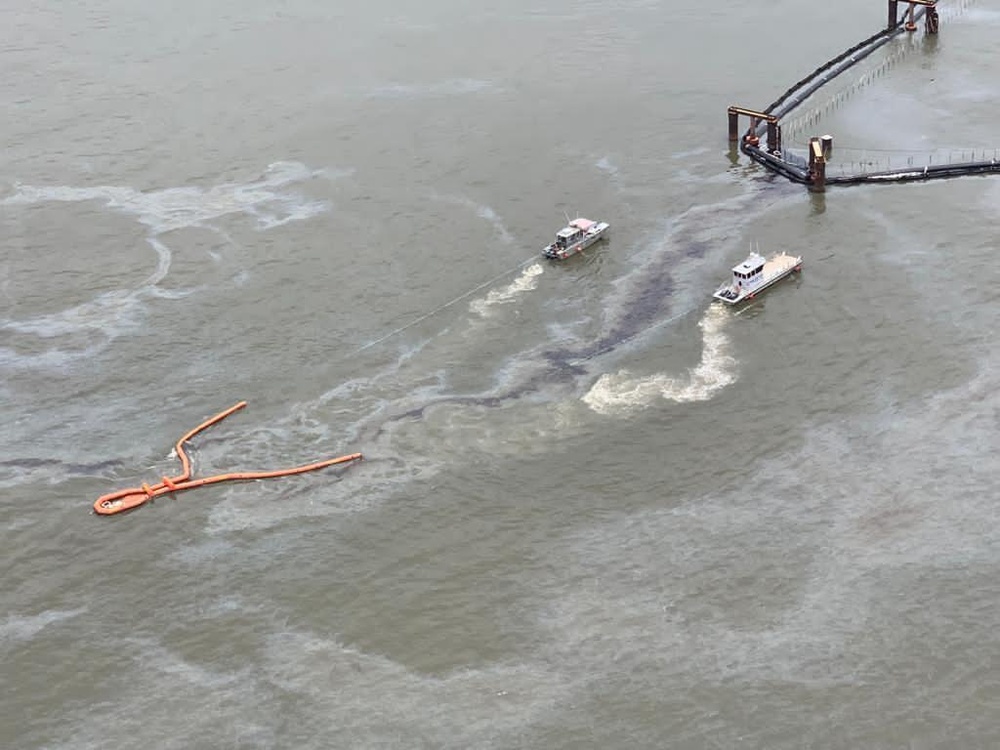 Response vessels use a Current Buster to contain an oil discharge