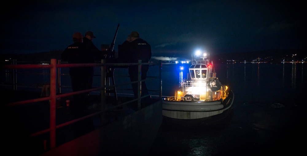Tug Boat Pulls Nimitz in Preperation for Underway