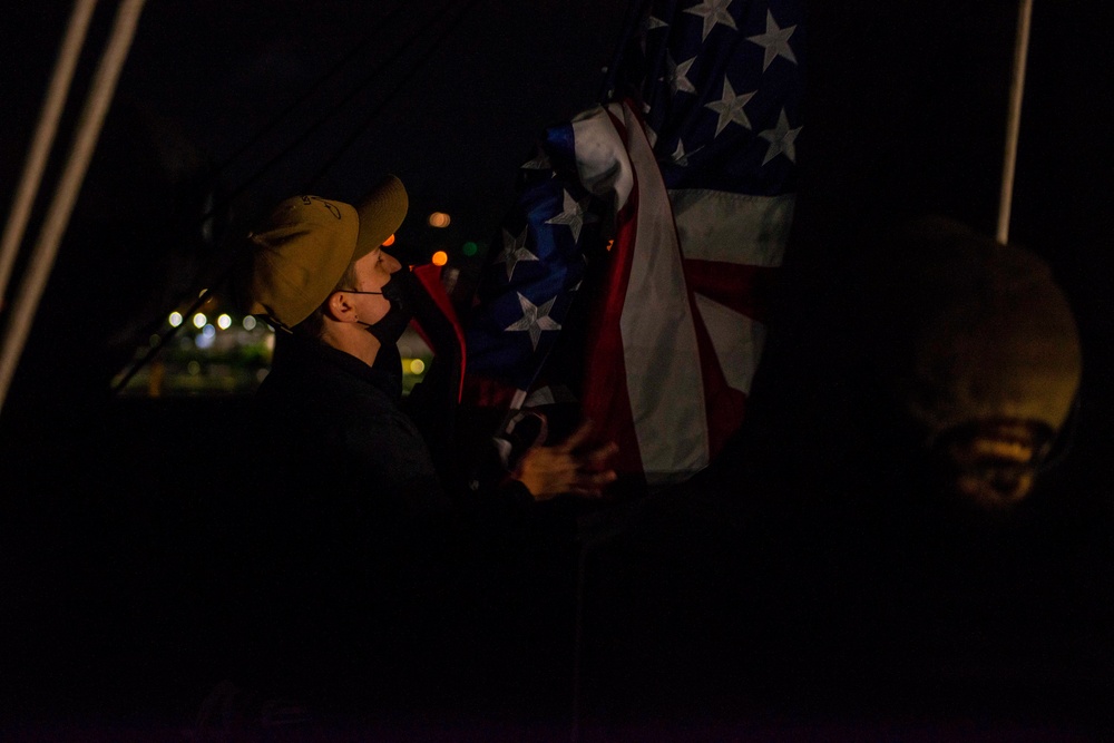 Sailors Raise The National Ensign
