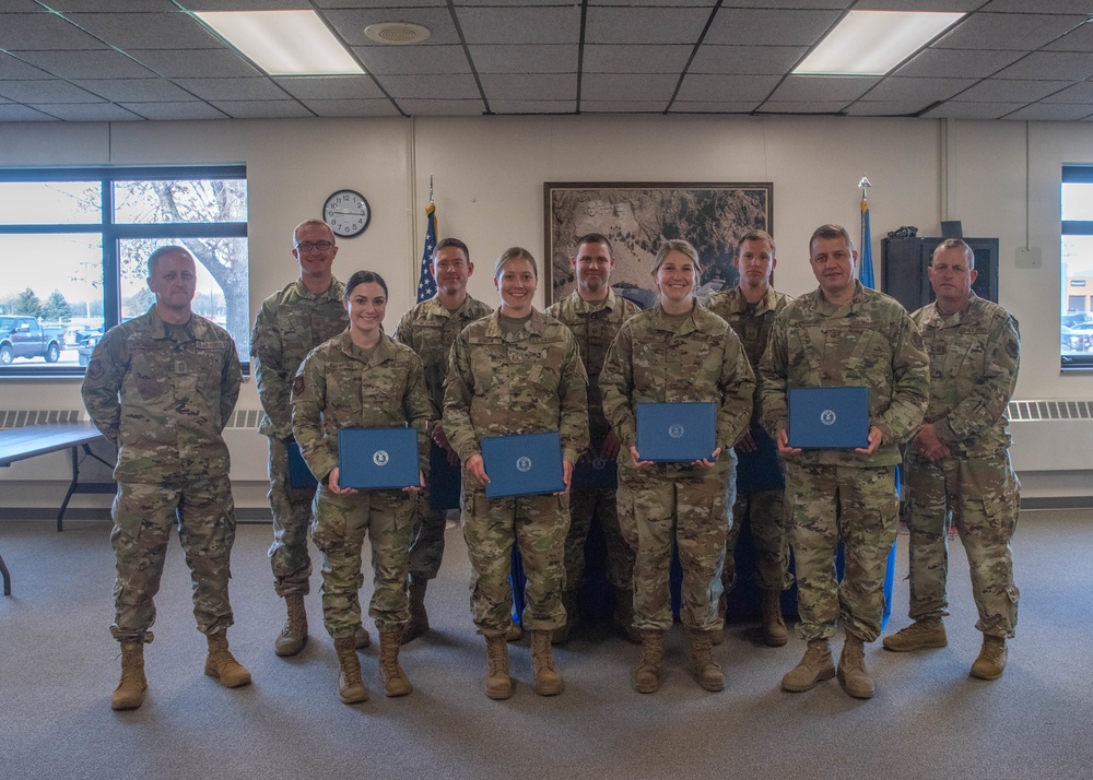 Members of the 114th Fighter Wing graduate from Community College of the Air Force