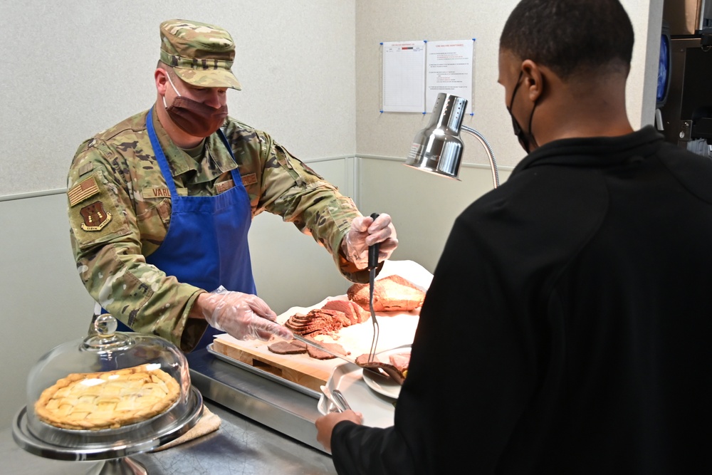 Leadership serving Thanksgiving meal