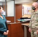 Lt. Gen. Place meets an Emergency Department staff at Brian D. Allgood Army Community Hospital