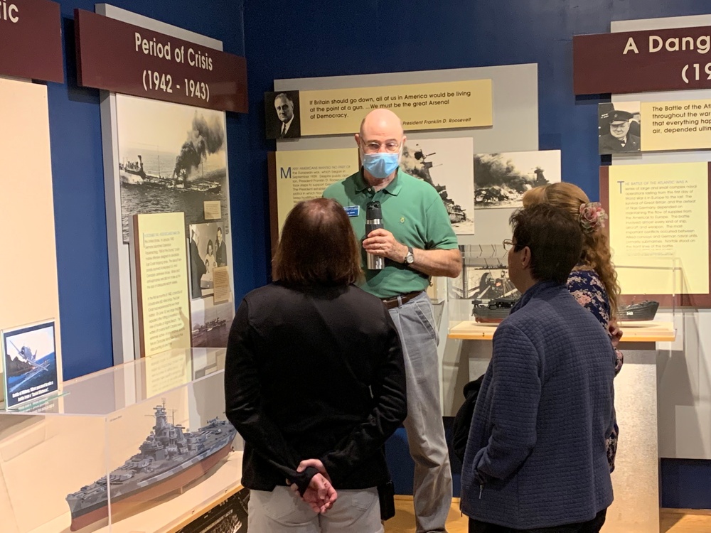 Museum volunteer leads guided tour