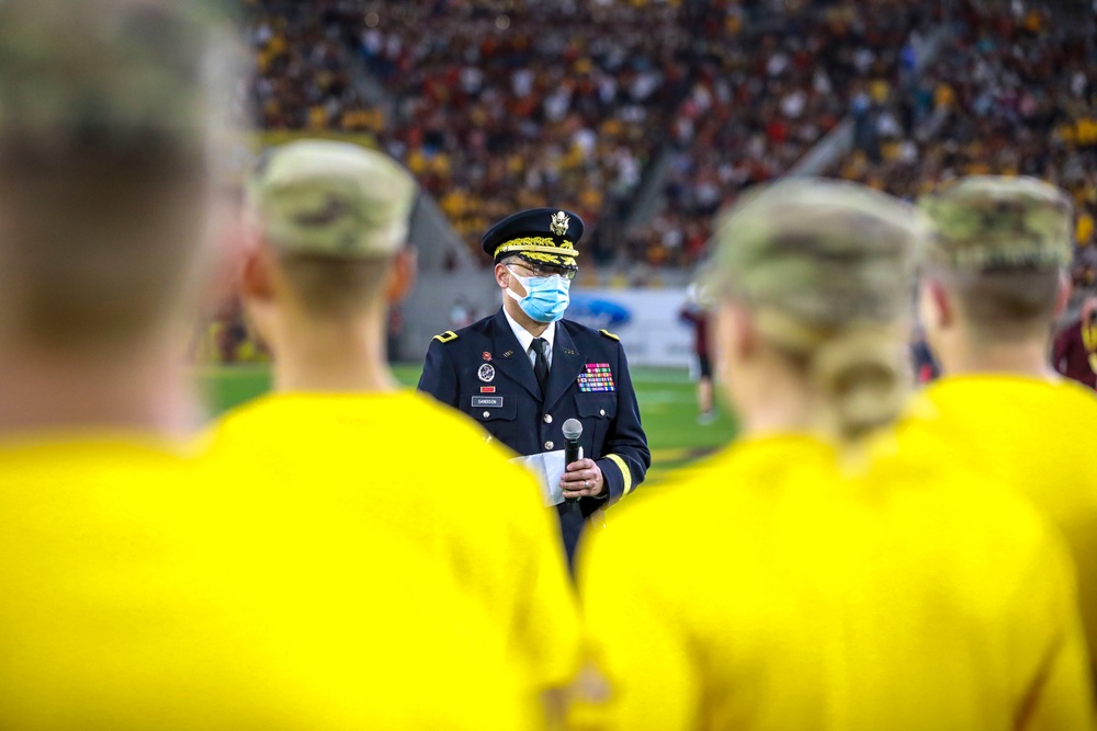 Brig. Gen. Christopher Sandison, Deputy Adjutant General, Arizona National Guard administers the Oath of Enlistment during ASU Salute to Service Game.