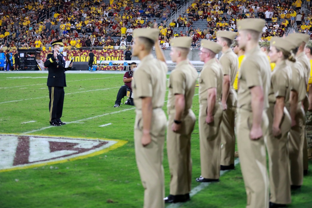 Brig. Gen. Christopher Sandison, Deputy Adjutant General, Arizona National Guard administers the Oath of Enlistment during ASU Salute to Service Game.