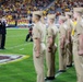 Brig. Gen. Christopher Sandison, Deputy Adjutant General, Arizona National Guard administers the Oath of Enlistment during ASU Salute to Service Game.