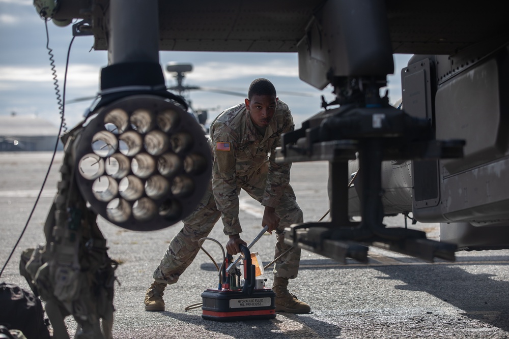 3rd Combat Aviation Brigade conducts aerial gunnery with new AH-64E Apaches.