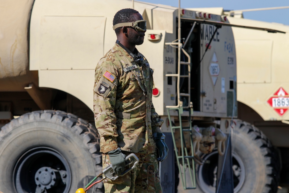 Marne Air Soldiers conduct forward arming and refueling point operations during aerial gunnery.