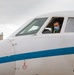 UN Command-Rear representatives and members of the French Navy observe takeoff and landing of the Falcon F200