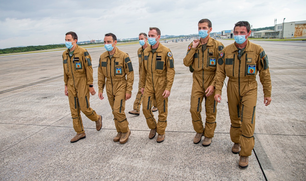 UN Command-Rear representatives and members of the French Navy observe takeoff and landing of the Falcon F200