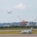 UN Command-Rear representatives and members of the French Navy observe takeoff and landing of the Falcon F200