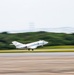 UN Command-Rear representatives and members of the French Navy observe takeoff and landing of the Falcon F200