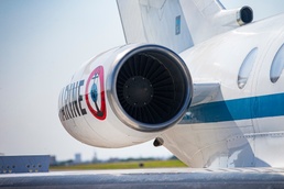 UN Command-Rear representatives and members of the French Navy observe takeoff and landing of the Falcon F200
