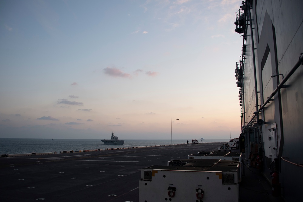 USS America Sails Alongside JS Ise