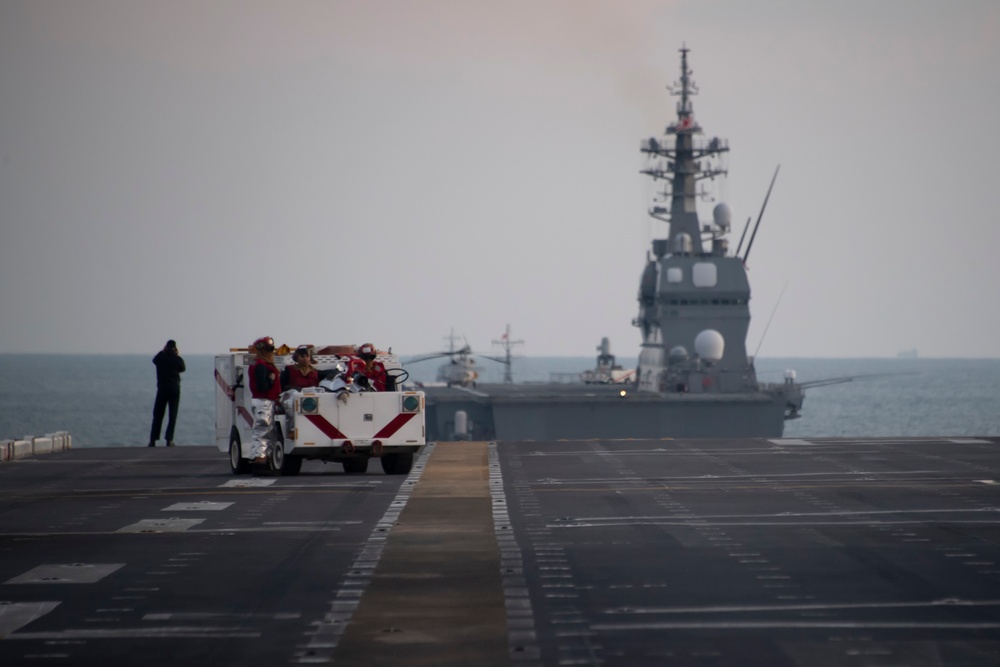 USS America Sails Alongside JS Ise