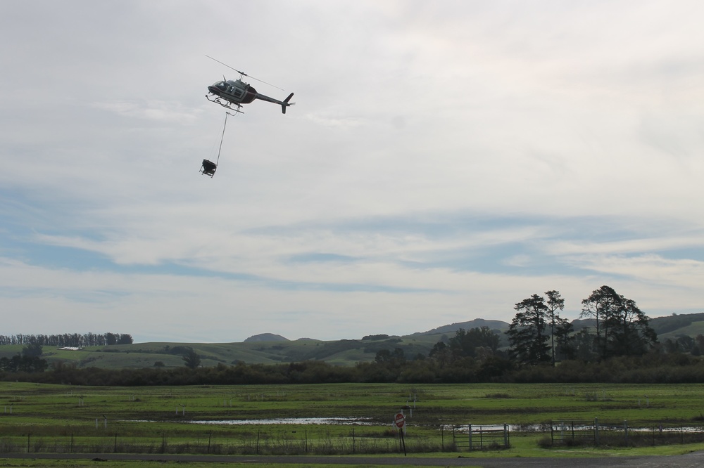 Local Farmer seeds TRACEN Petaluma by helicopter