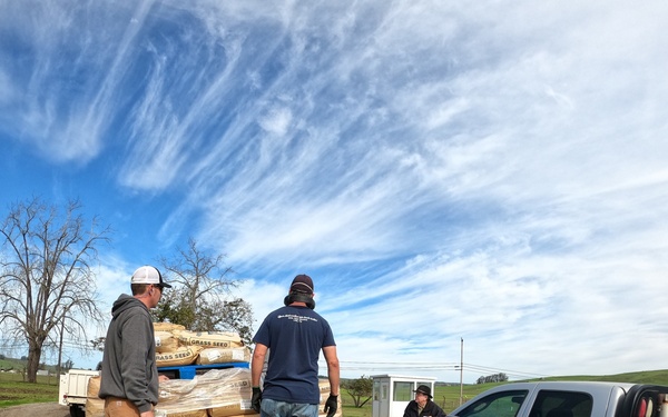 Local Farmer offloads organic seed for TRACEN Petaluma