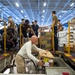 USS Carl Vinson (CVN 70) Sailors Distribute Mail