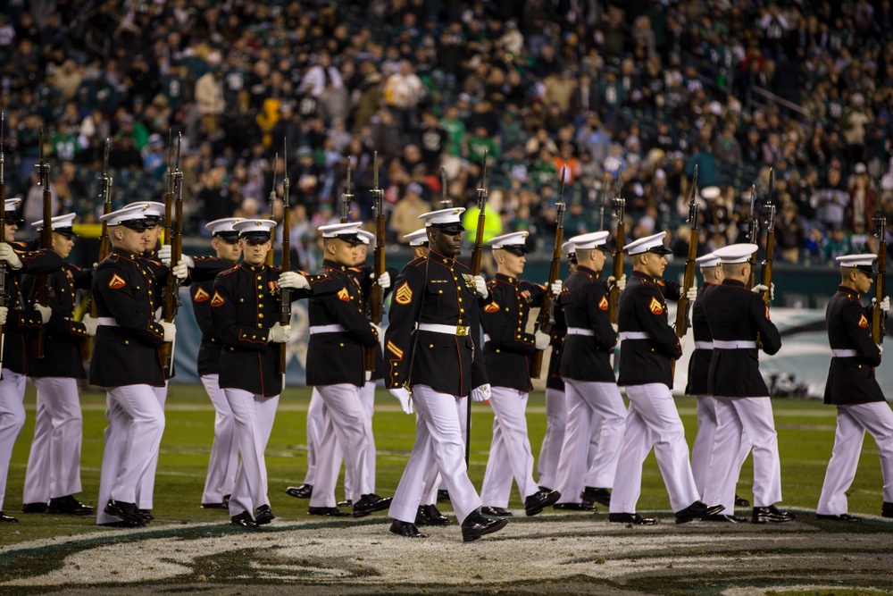 Marines with the Silent Drill Platoon perform during a halftime show at Lincoln Financial Field in Philadelphia