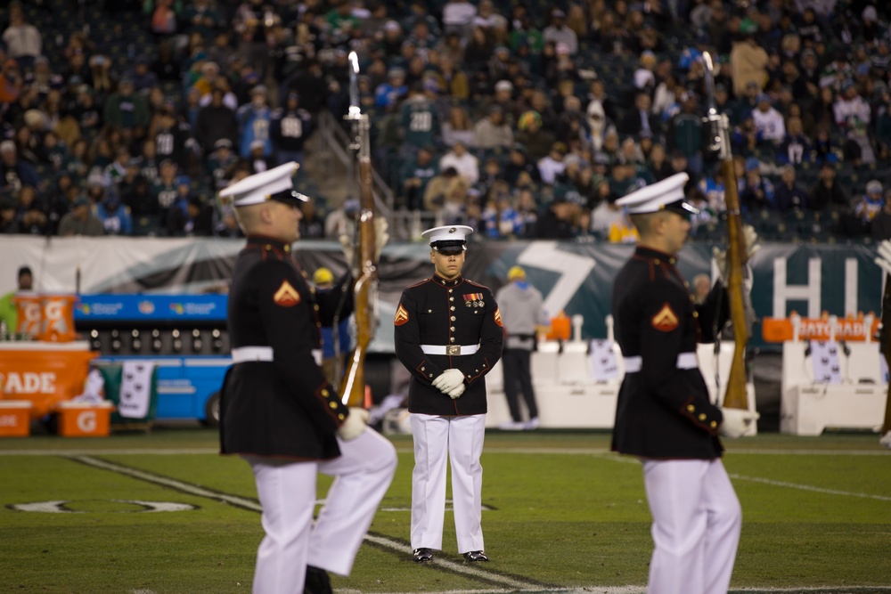 Marines with the Silent Drill Platoon perform during a halftime show at Lincoln Financial Field in Philadelphia