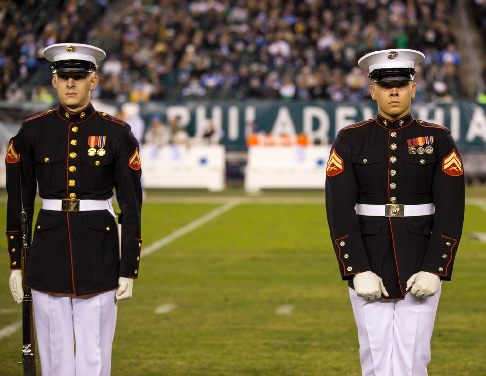 Marines with the Silent Drill Platoon perform during a halftime show at Lincoln Financial Field in Philadelphia