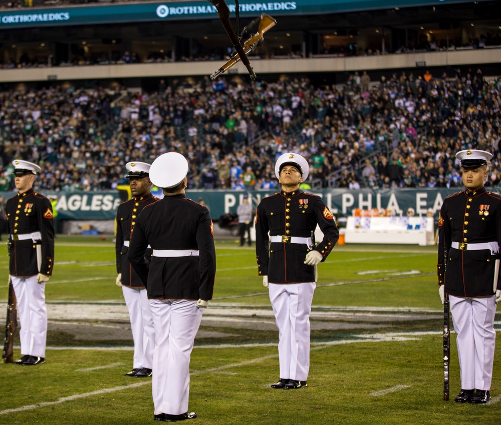 Marines with the Silent Drill Platoon perform during a halftime show at Lincoln Financial Field in Philadelphia