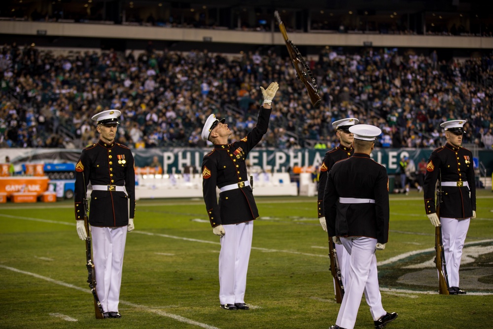 Marines with the Silent Drill Platoon perform during a halftime show at Lincoln Financial Field in Philadelphia