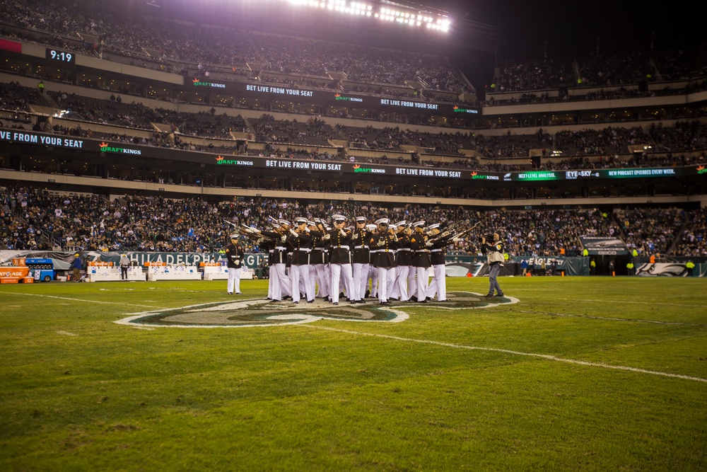 Marines with the Silent Drill Platoon perform during a halftime show at Lincoln Financial Field in Philadelphia