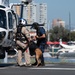 Coast Guard member conducts K9 hoist training