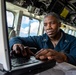 USS Charleston Sailor Prepares Weather Report