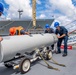 USS Charleston Sailors Transport Airbourne Laser Mine Detection System
