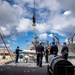 USS Charleston Sailors Transport Airbourne Laser Mine Detection System