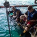 USS Charleston Sailors Conduct Maintenance on Water Jet