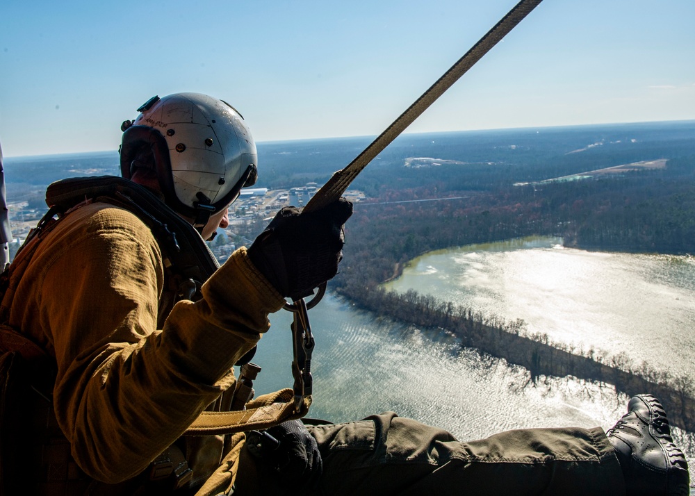 Aircrewman Conducts a Daytime Familiarization Flight