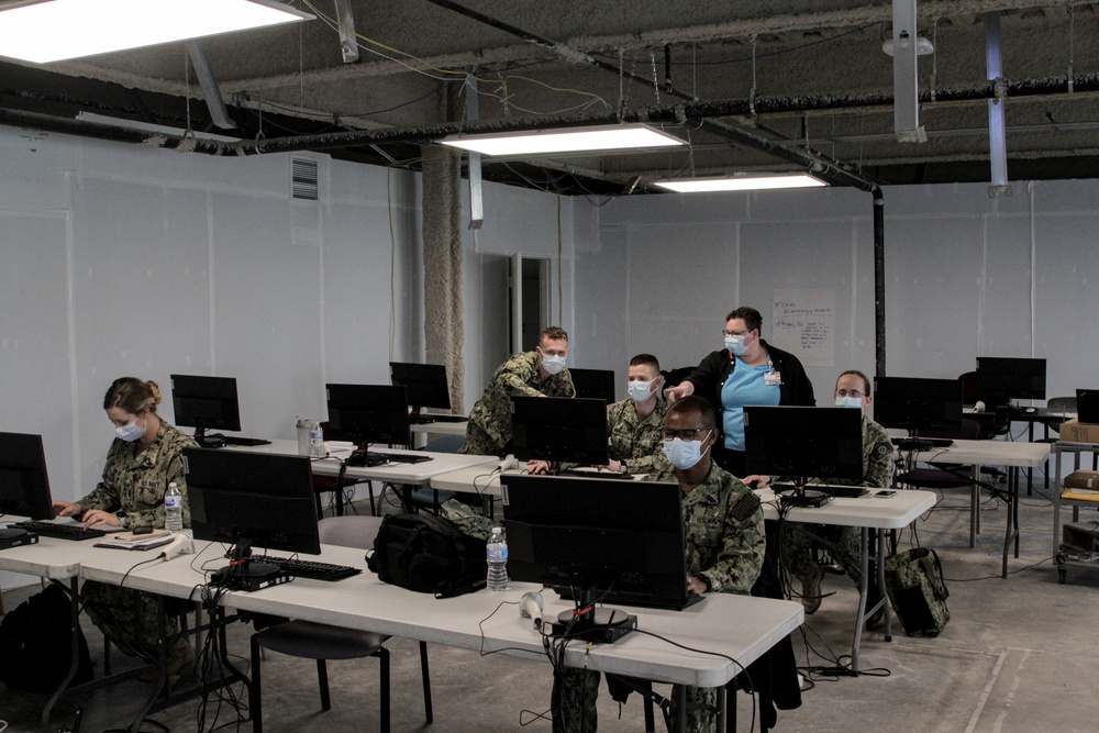 U.S. Navy Personnel Conduct In Processing Operations At Billings Clinic Hospital In Billings, Montana