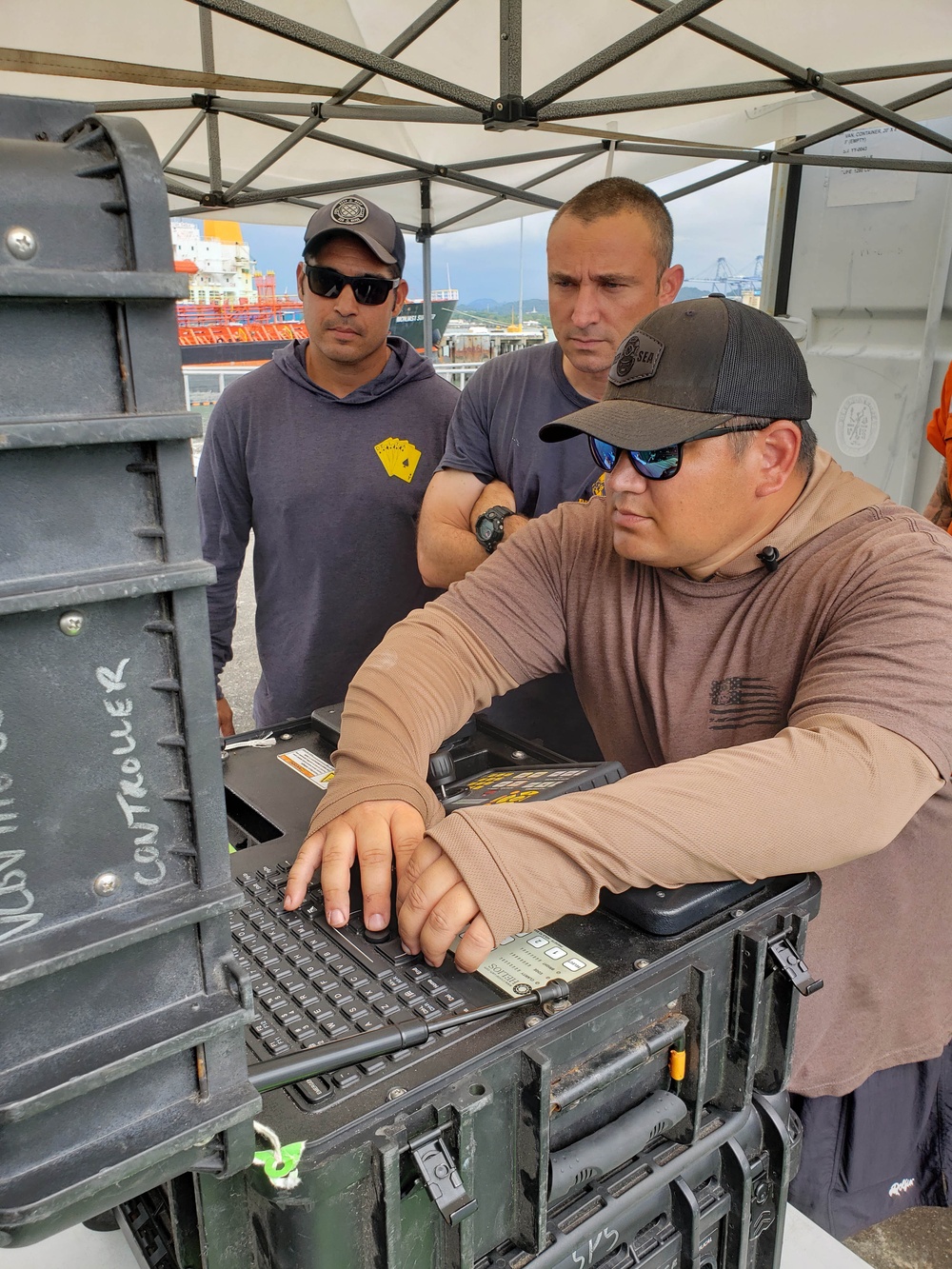 MDSU 2 Divers Monitor Images Relayed From ROV During Salvage Ops