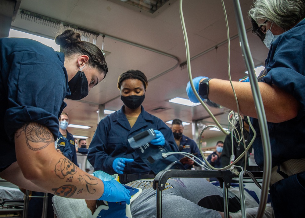 USNS Mercy (T-AH 19) Medical Treatment Facility (MTF) Sailors Treat a Mock Patient During MERCEX 22-1 Drill