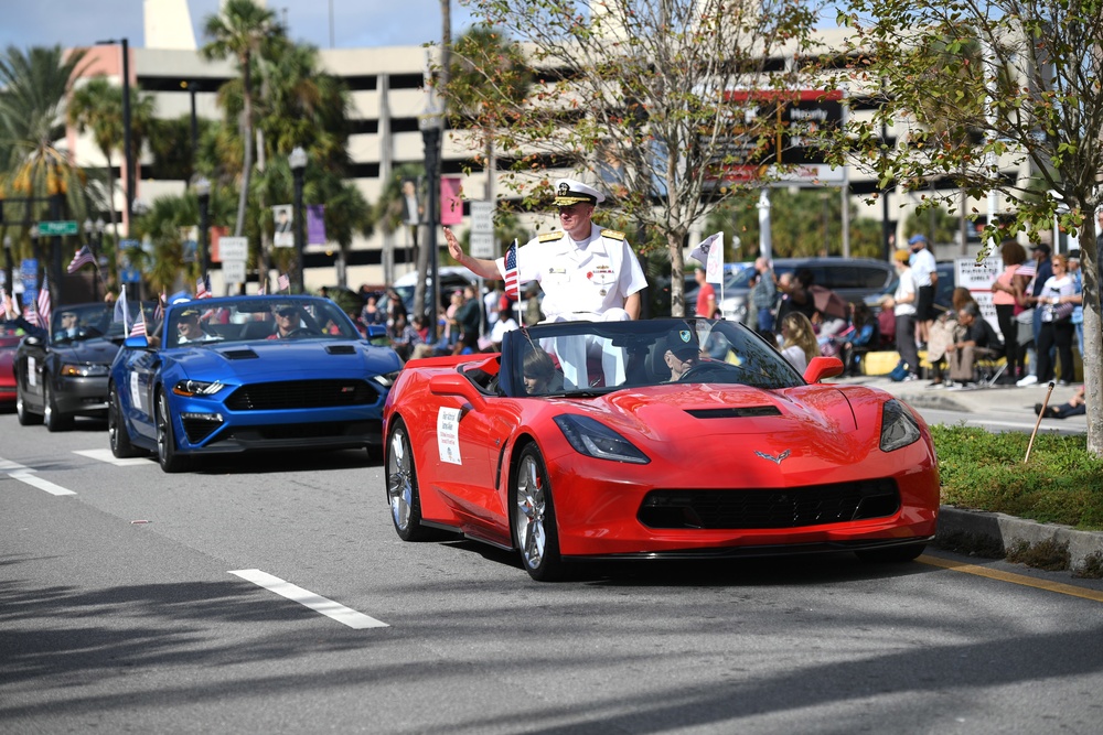Commander, U.S. Naval Forces Southern Command/U.S. 4th Fleet Waves to the Crowd at Veterans Day Parade