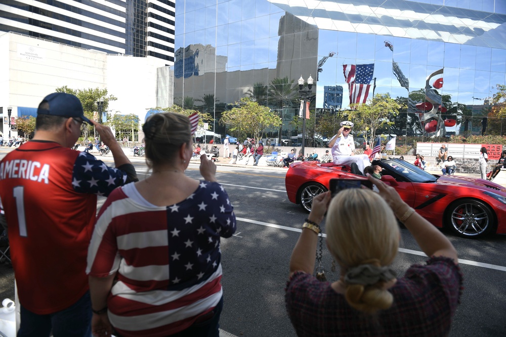 Commander, U.S. Naval Forces Southern Command/U.S. 4th Fleet Salutes the Crowd at Veterans Day Parade