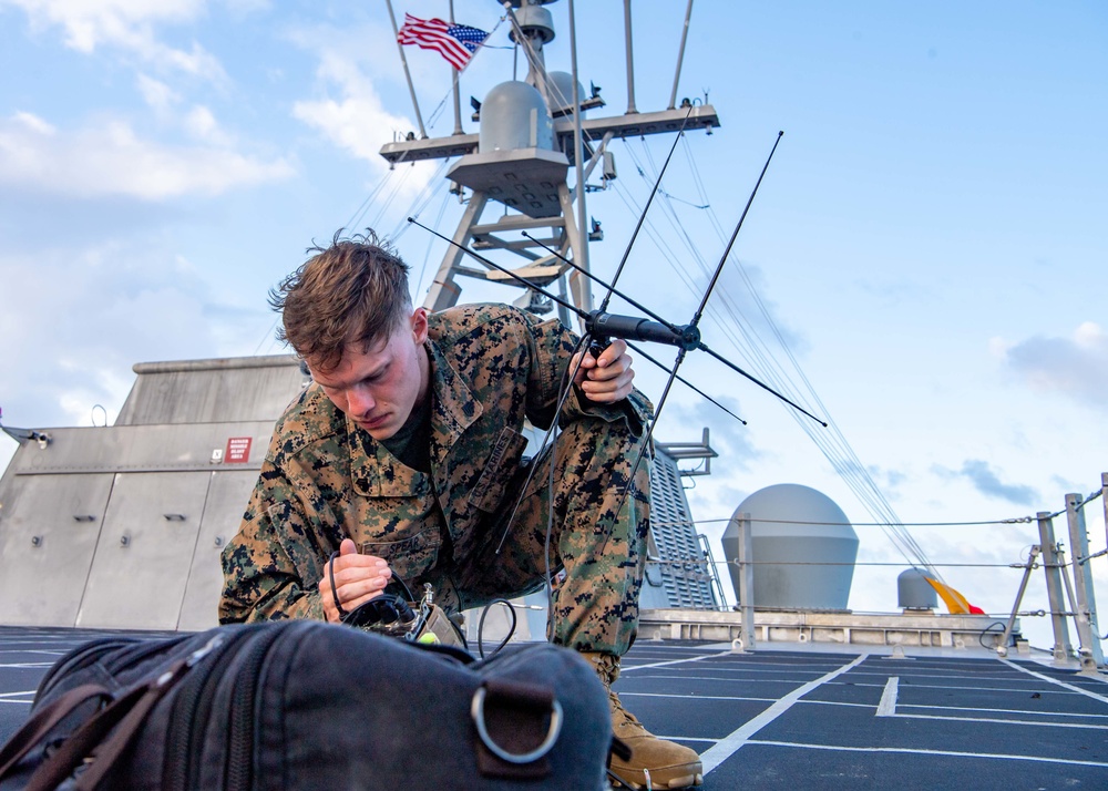 U.S. Marine aboard USS Charleston OP Tests Equipment