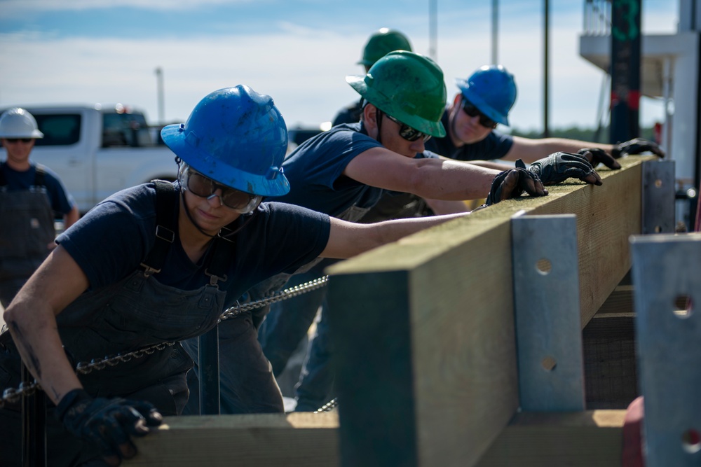 The crew aboard Coast Guard Cutter Pamlico performs a deck evolution