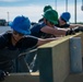 The crew aboard Coast Guard Cutter Pamlico performs a deck evolution