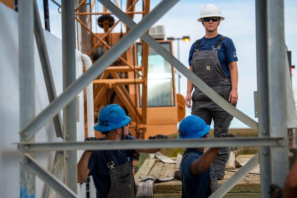 The crew aboard Coast Guard Cutter Pamlico performs a deck evolution