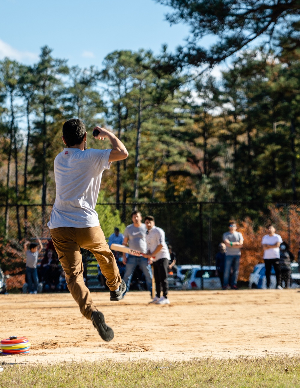 Afghan Evacuees with TF Eagle play Cricket Game at Fort Lee